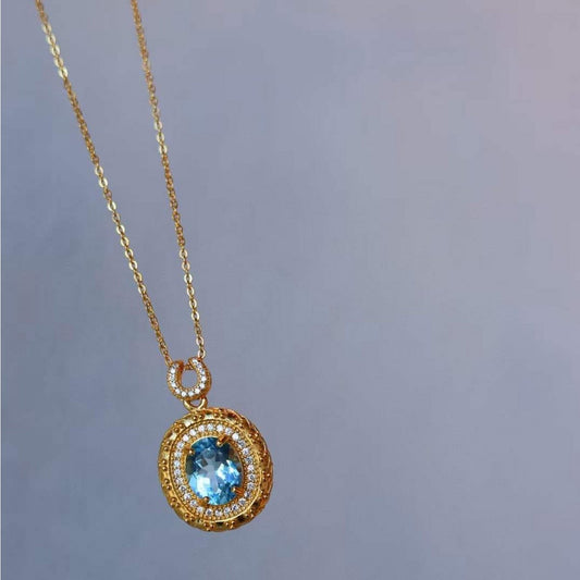 Tijdloos design natuurlijke blauwe topaas ovale hanger ketting - Goud vermeil