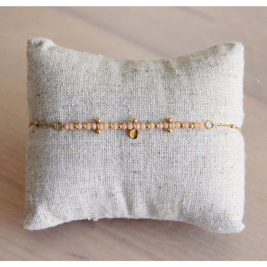 Fijne roestvrijstalen armband met facetten en kralen - Nude/Goud