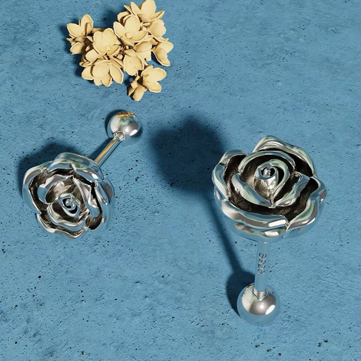Pendientes estilo vintage con pequeñas rosas plateadas
