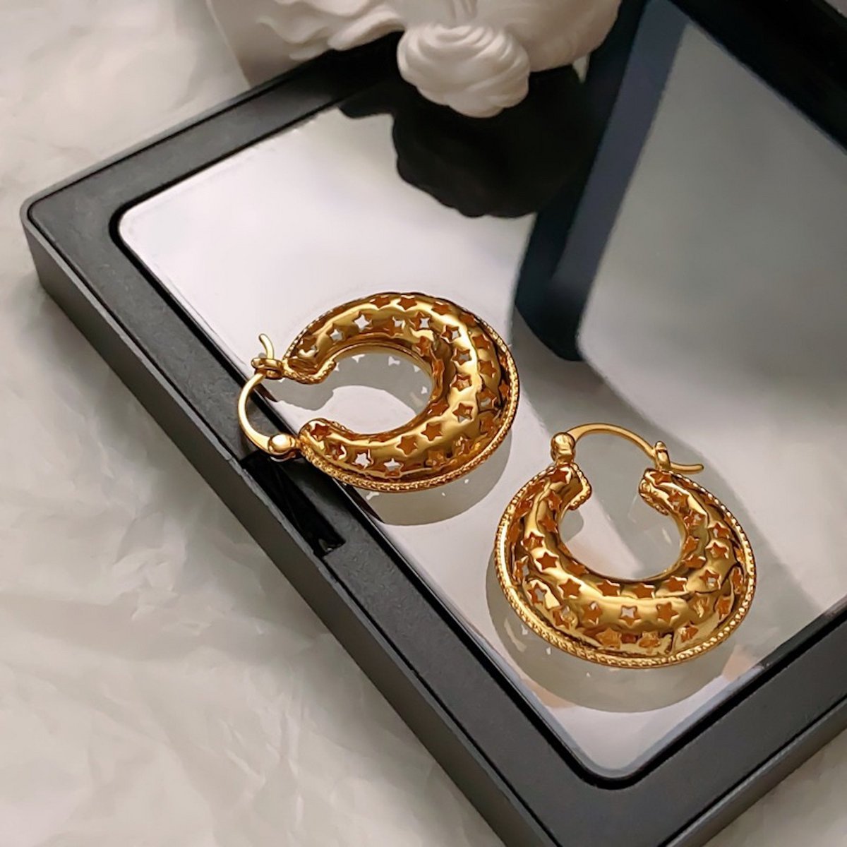 Pendientes huecos estilo vintage patrones de estrellas