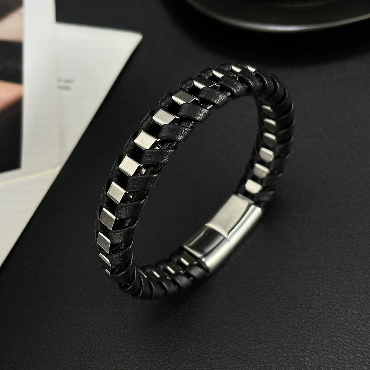 Stevig gevlochten lederen en stalen herenarmband