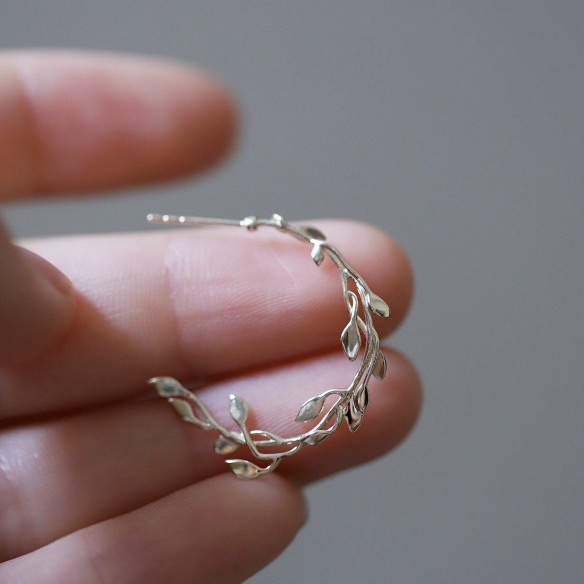 Lauwerkrans - Elegante bladoorring - goud vermeil & sterling zilver