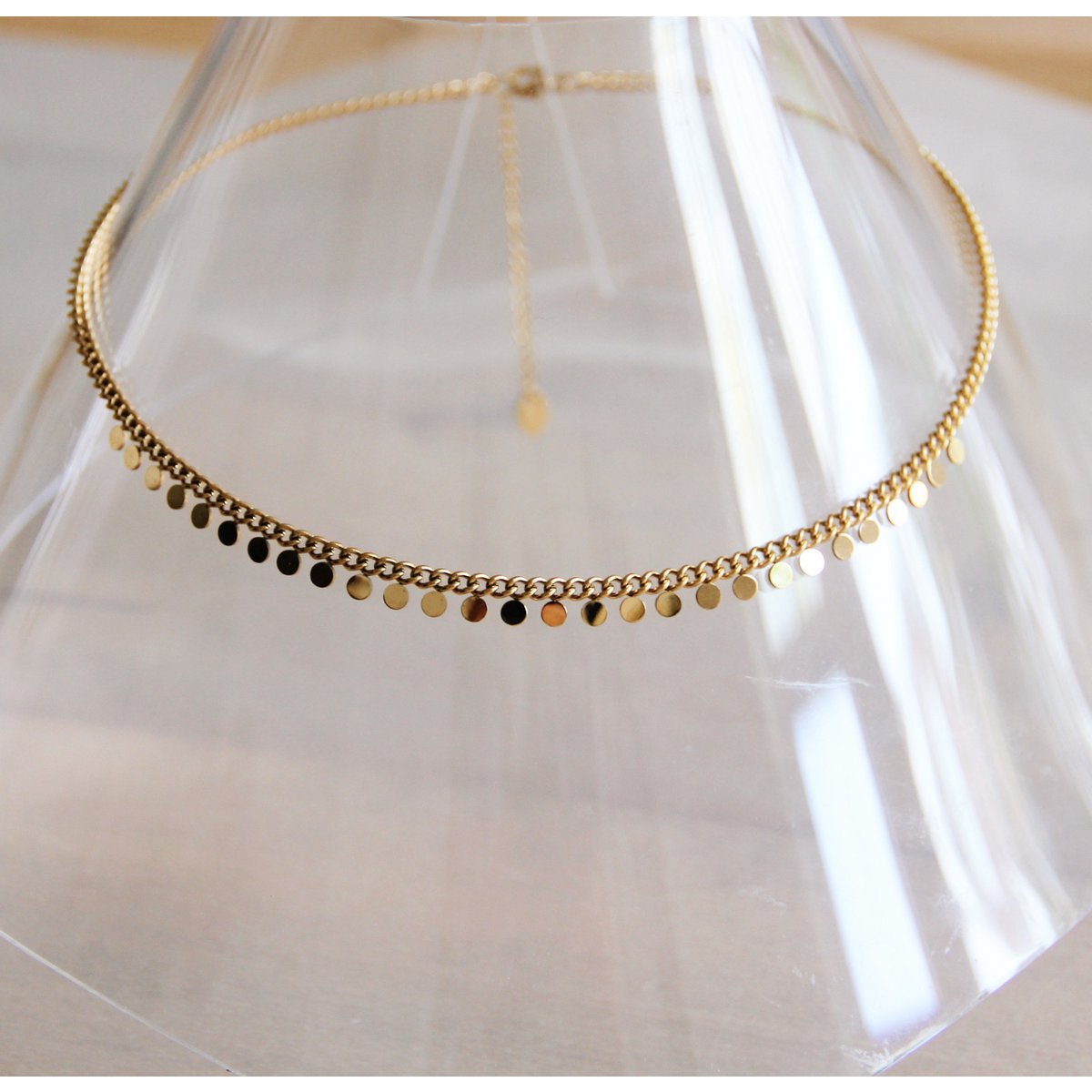 RVS schakelketting met muntjes - goud