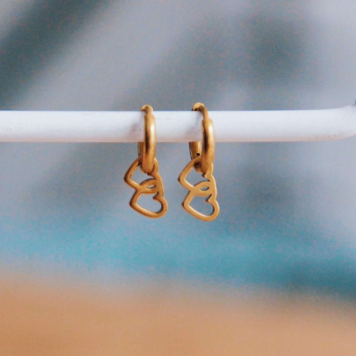 Pendientes de acero inoxidable con doble corazón - oro