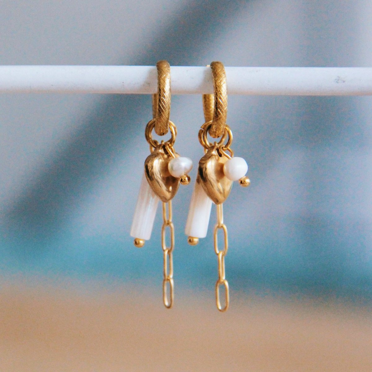 RVS bewerkte creool met koker, hart en ketting - parelmoer / goud