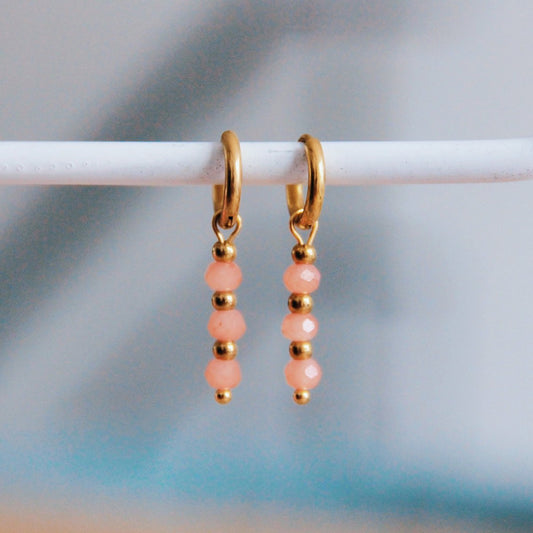 RVS oorbellen met facetten - oud roze